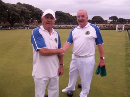 Brian Watts (l) is congratulated by John Leighton